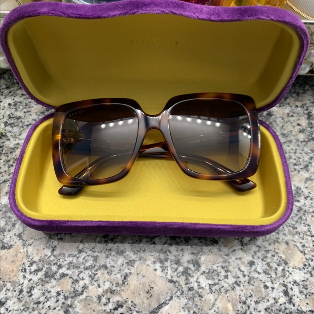 Gucci Sunglasses.